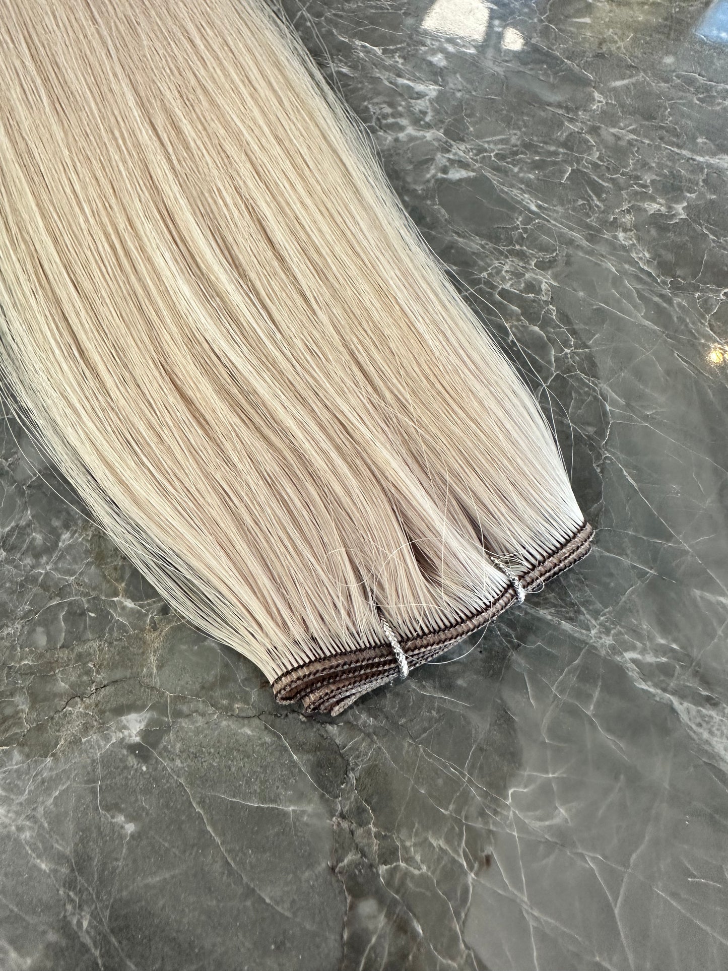 Genius trense. 50 gram. Ice Blond. Farve 60A med mørk trense